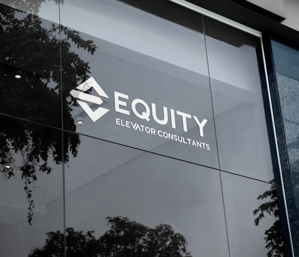Equity Elevator Consultants logo on glass office frontage.