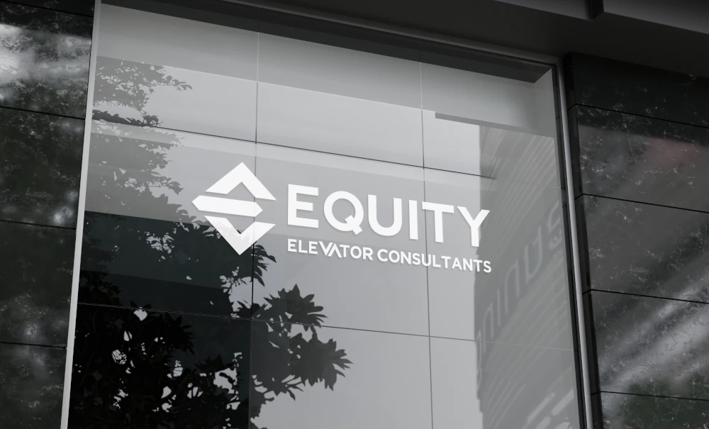 Equity Elevator Consultants logo displayed on modern office glass frontage.